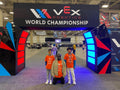 VEX IQ team at competition with their robot